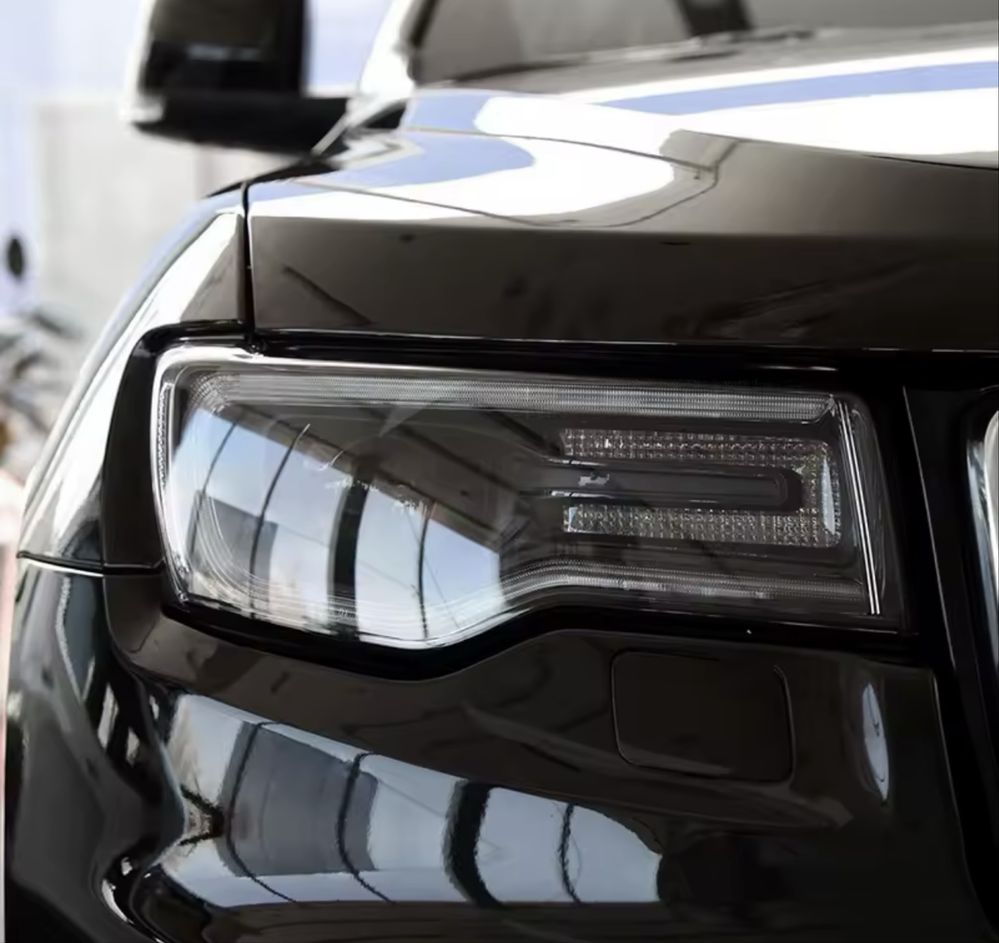 Стъкло за ляв фар за Jeep Grand Cherokee wk2