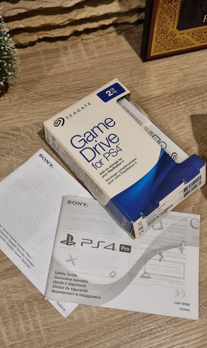 PlayStation 4 Pro + accesorii și jocuri