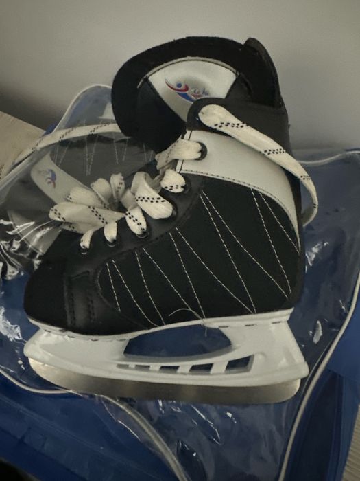 Коньки хокейнные  и роликвые коньки