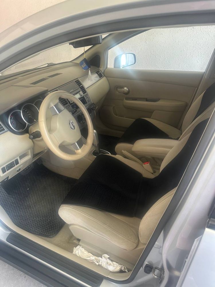 Nissan   Tiida 1,6