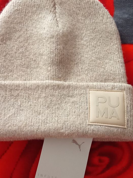 Căciulă puma originală nouă.