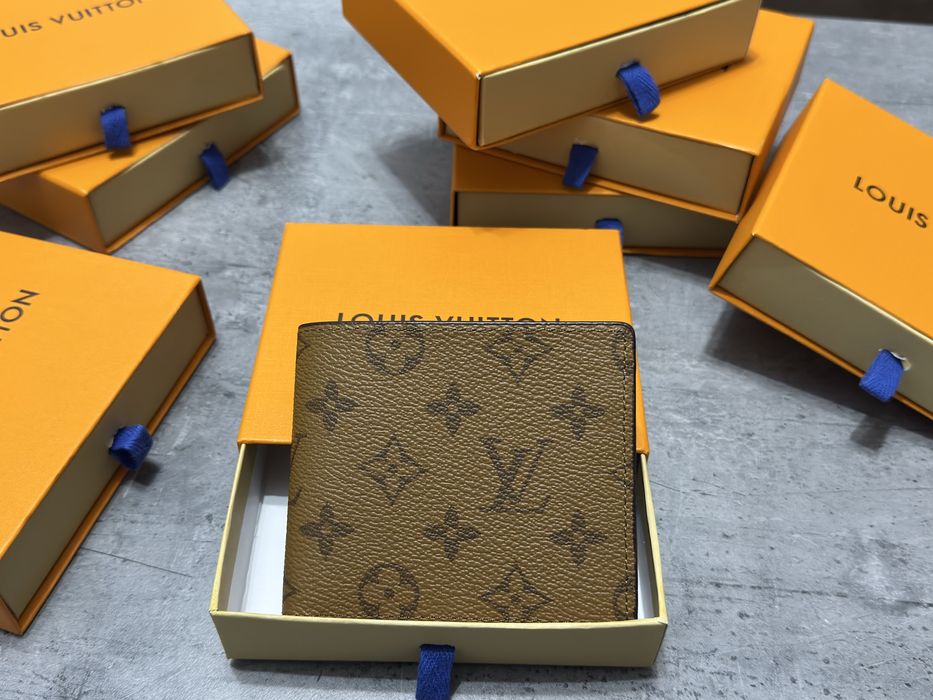 Portofele Louis Vuitton din piele