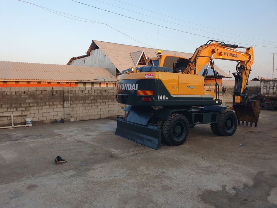 Экскаватор 140 с гидромолотом