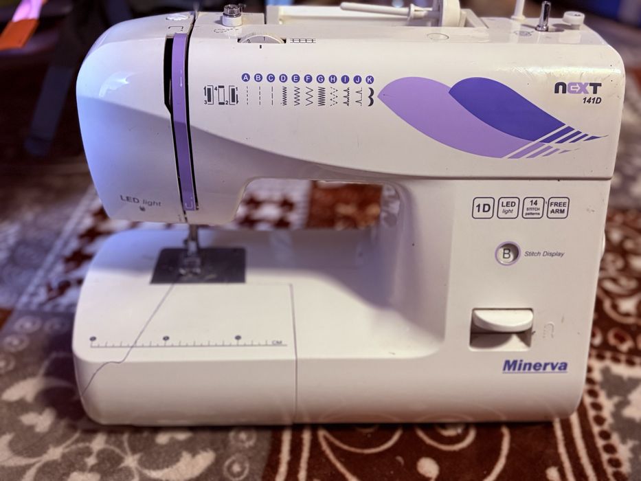 Masina de cusut electrica