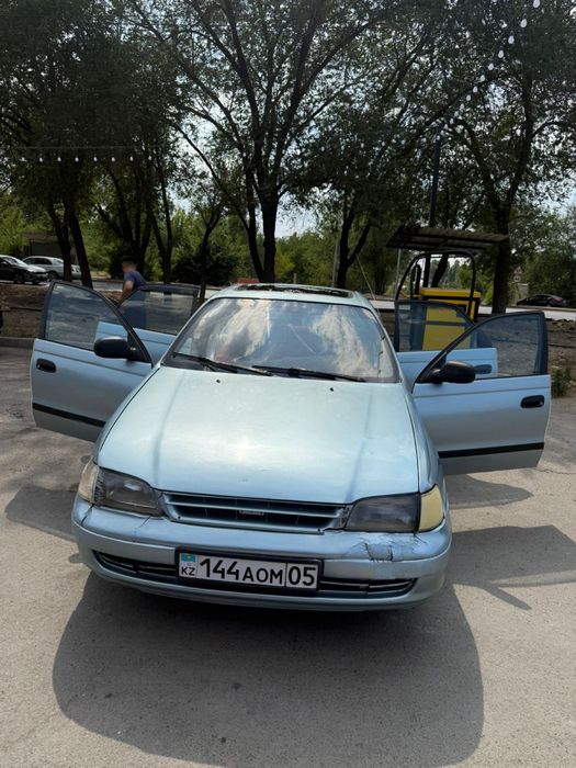 Toyota Carina E 1.6 — Техника на 5+, кузов требует косметику