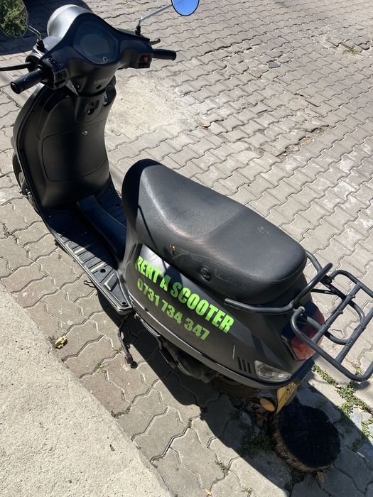 Vand scuter in 4 Timpi