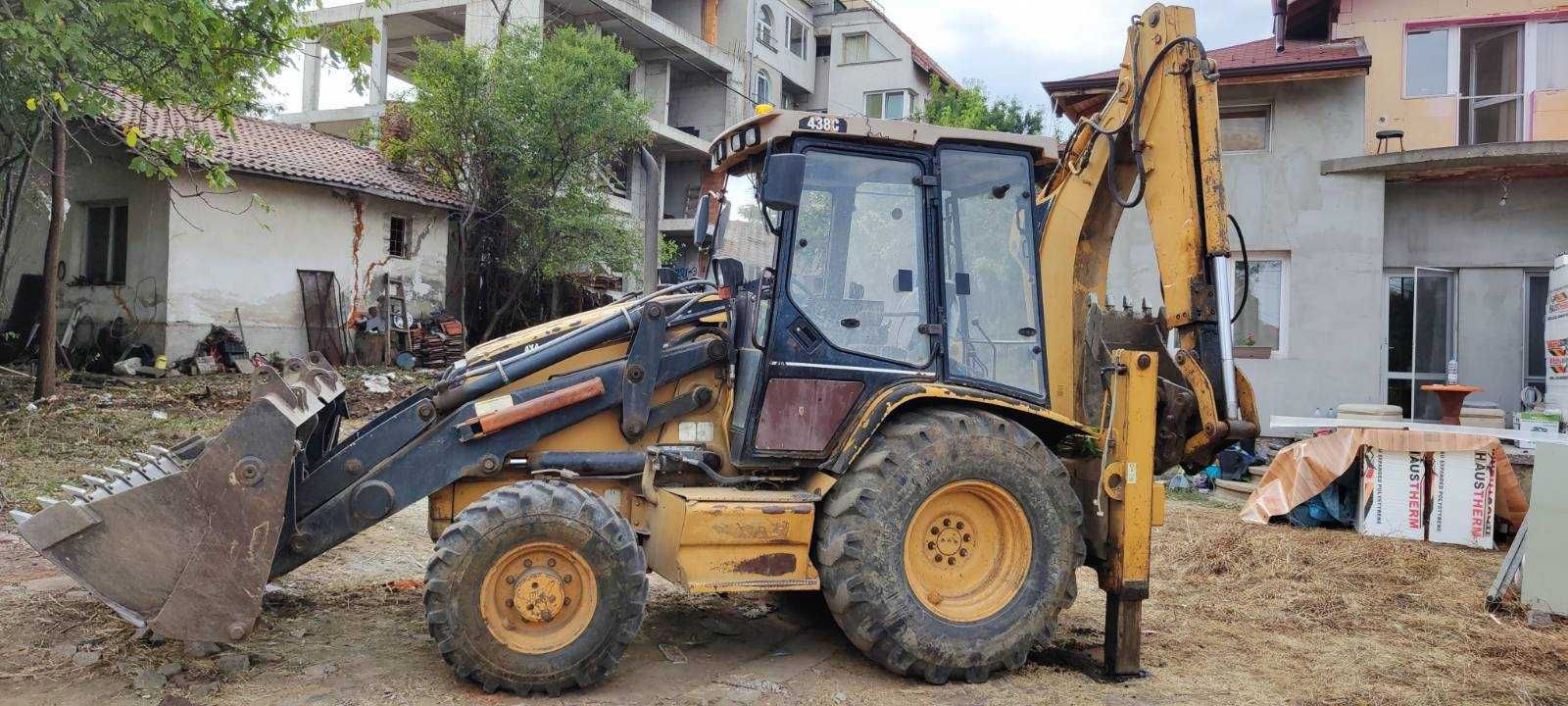 Багер Caterpillar 438c