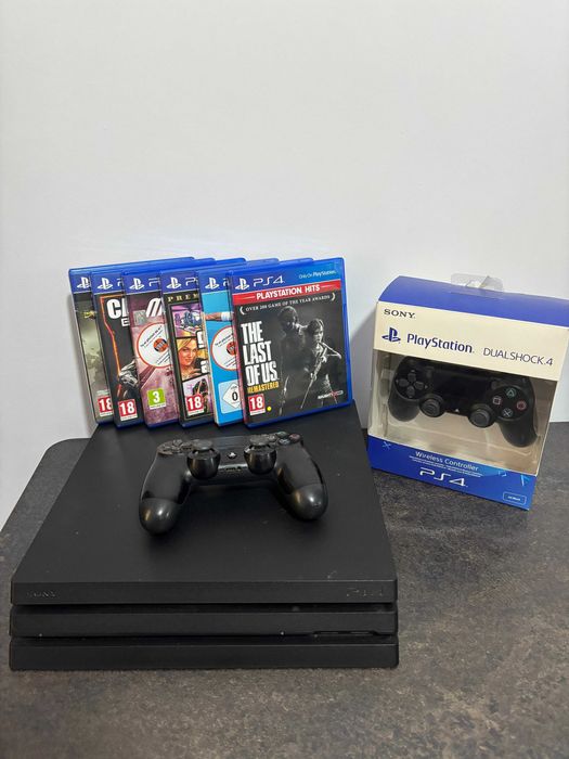 PS4 PRO cu 2 manete/controlere + 6 jocuri