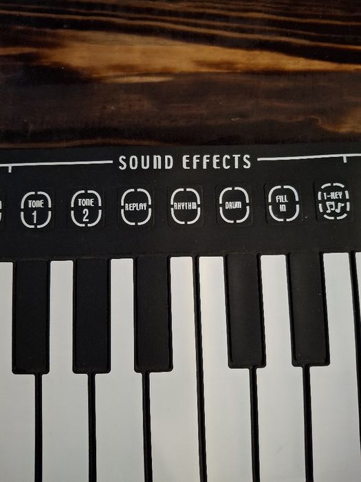 Hand roll piano.