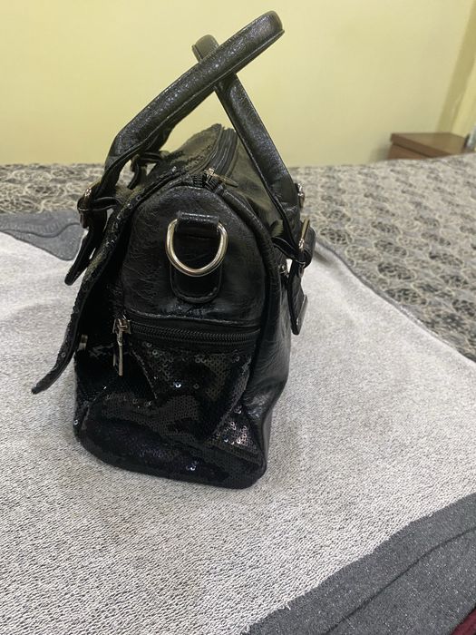 Аеллар сумкаси кора рангда холати яхши