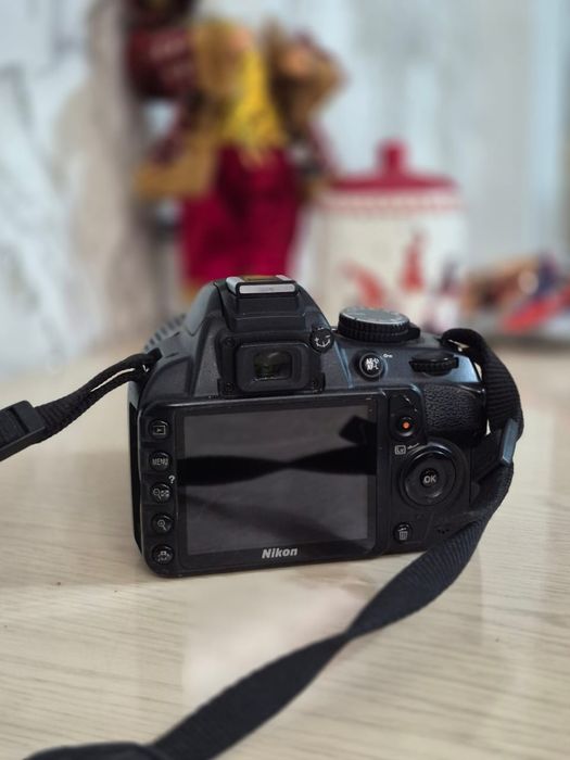 Продам зеркальный фотоаппарат Nikon 3100 в отличном состоянии.