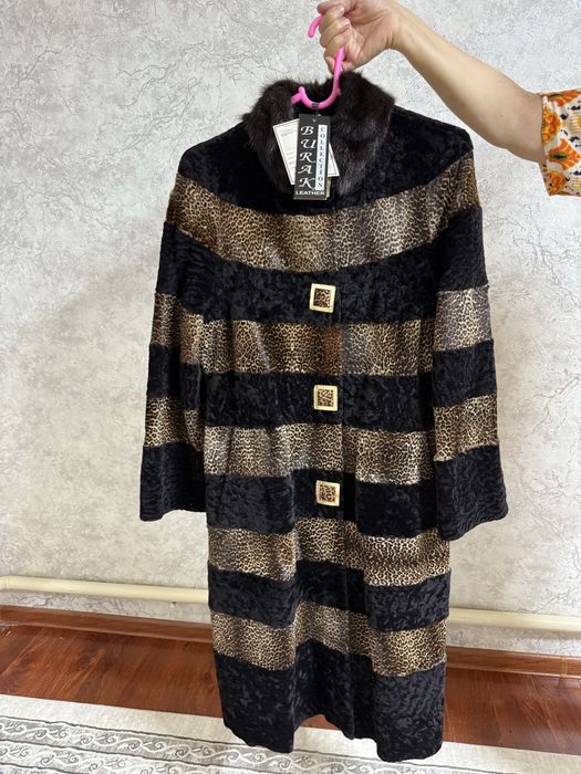 Новая мутоновая шуба сатылады. 52р. этикеткасымен