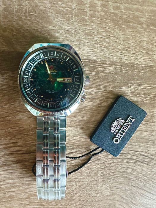 *Нов* часовник ORIENT WORLD MAP RA-AA0E02E
