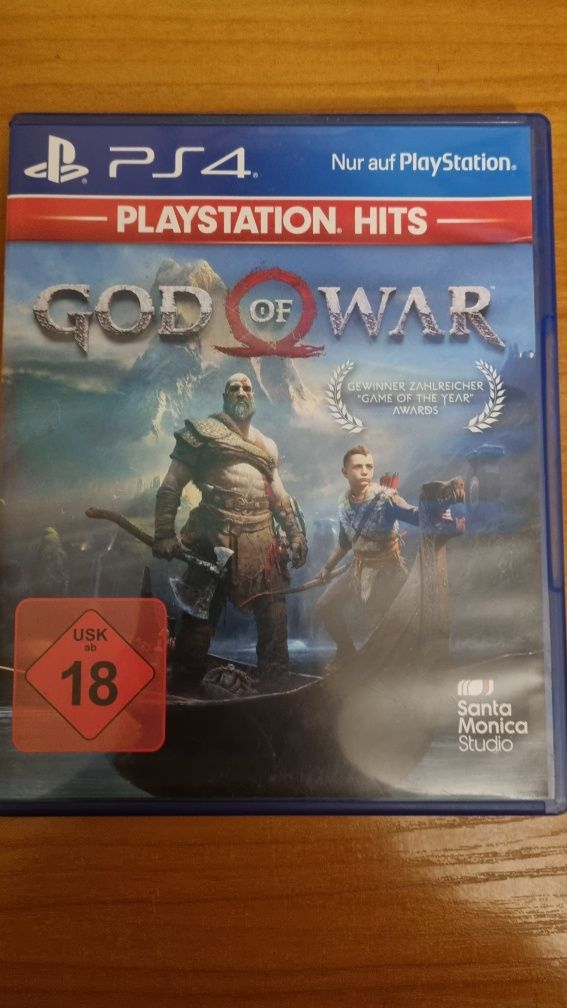 Игра за ps4.God of War