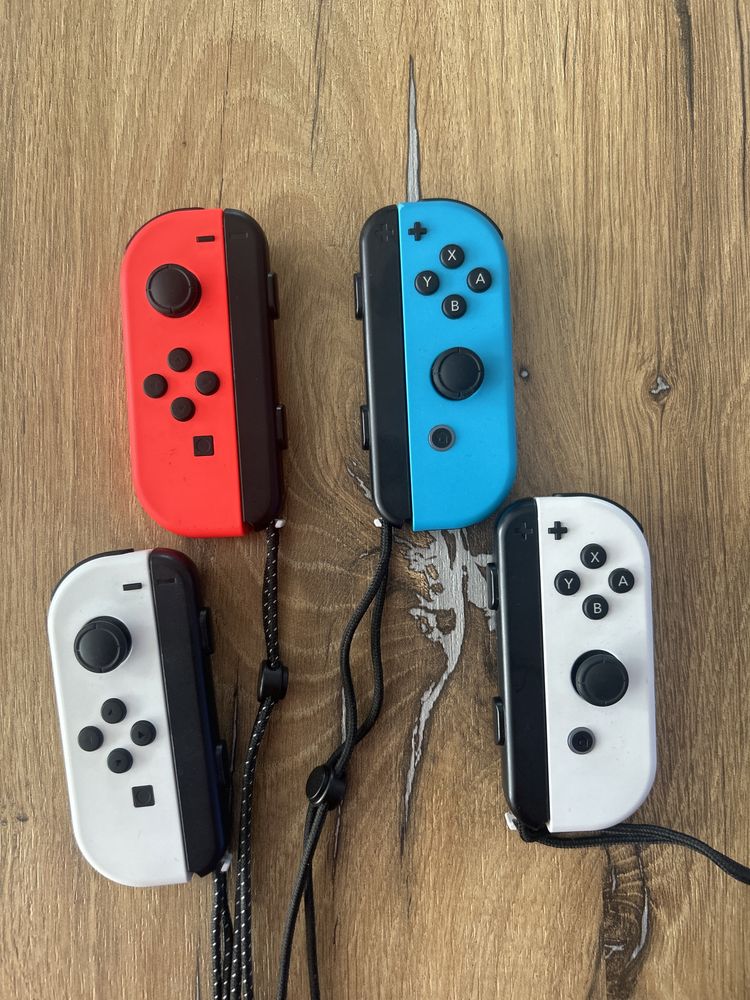 Nintendo Oled cu 4 joyconuri +ringfit adventure+ husa si folie sticla