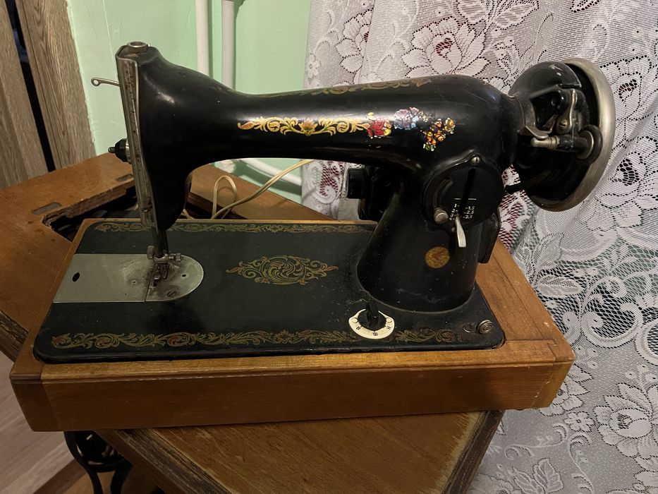 Vind Mașină de cusut Sunger.