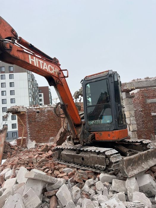 Снос зданий миниэкскаватором