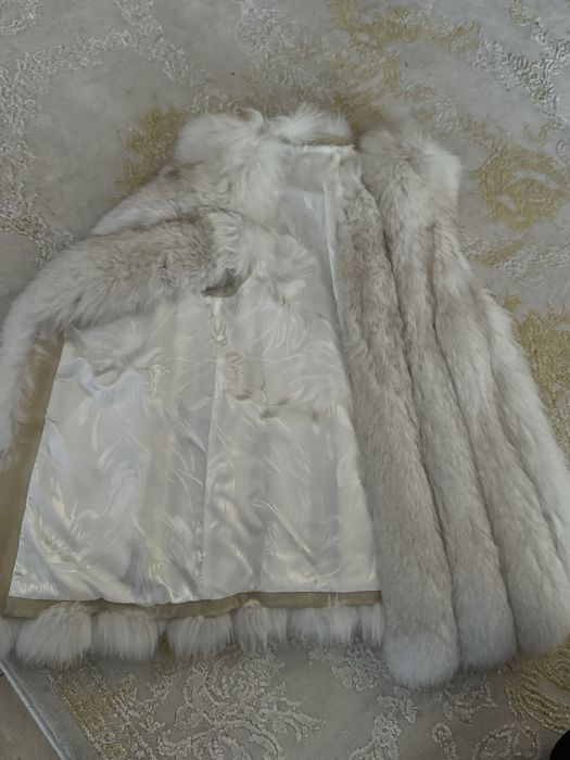 Vesta blana de vulpe