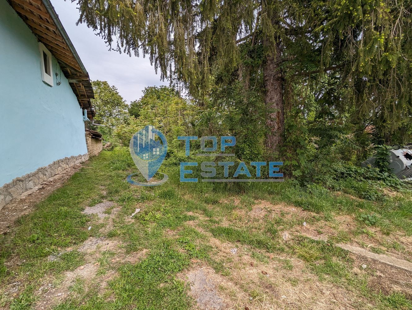 Парцел в регулация в центъра на село Миндя