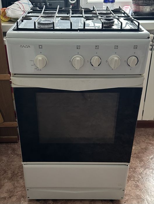 Продам б/у газовую  плиту марки лада