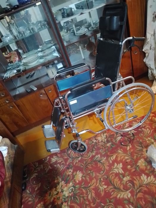 Инвалидная коляска.