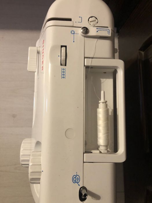 Mașina de cusut Singer