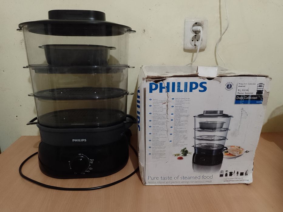 Aparat de gătit cu aburi Philips.