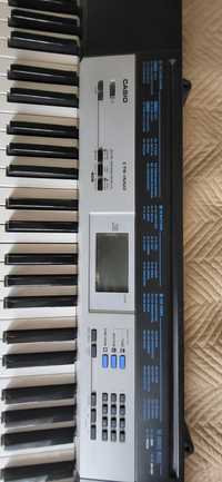 Синтезатор Casio СТК-1550. Есть подставка для нот