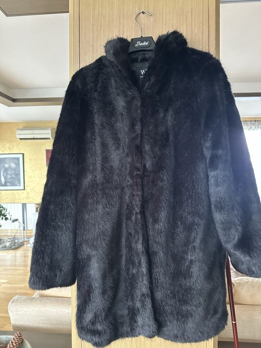 Тъмнокафяво палто астраган на Мелини