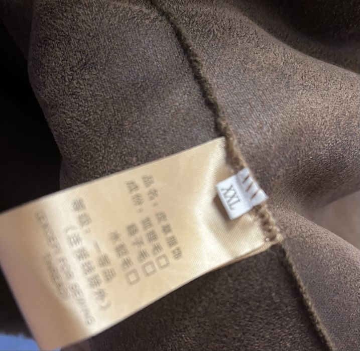 Почти новую искусственную шубку