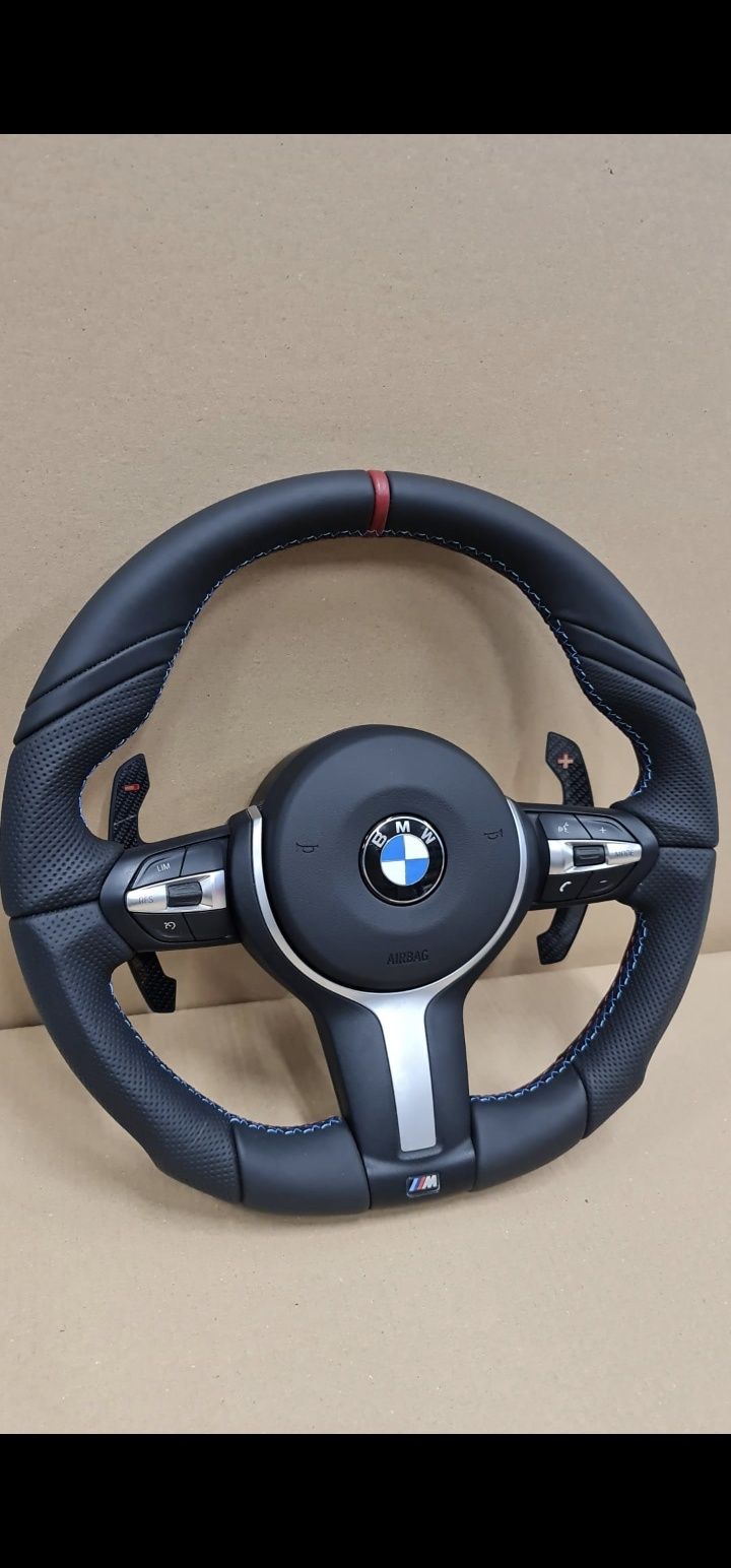 Volane ergonomice BMW, reducere pt Comenzi.