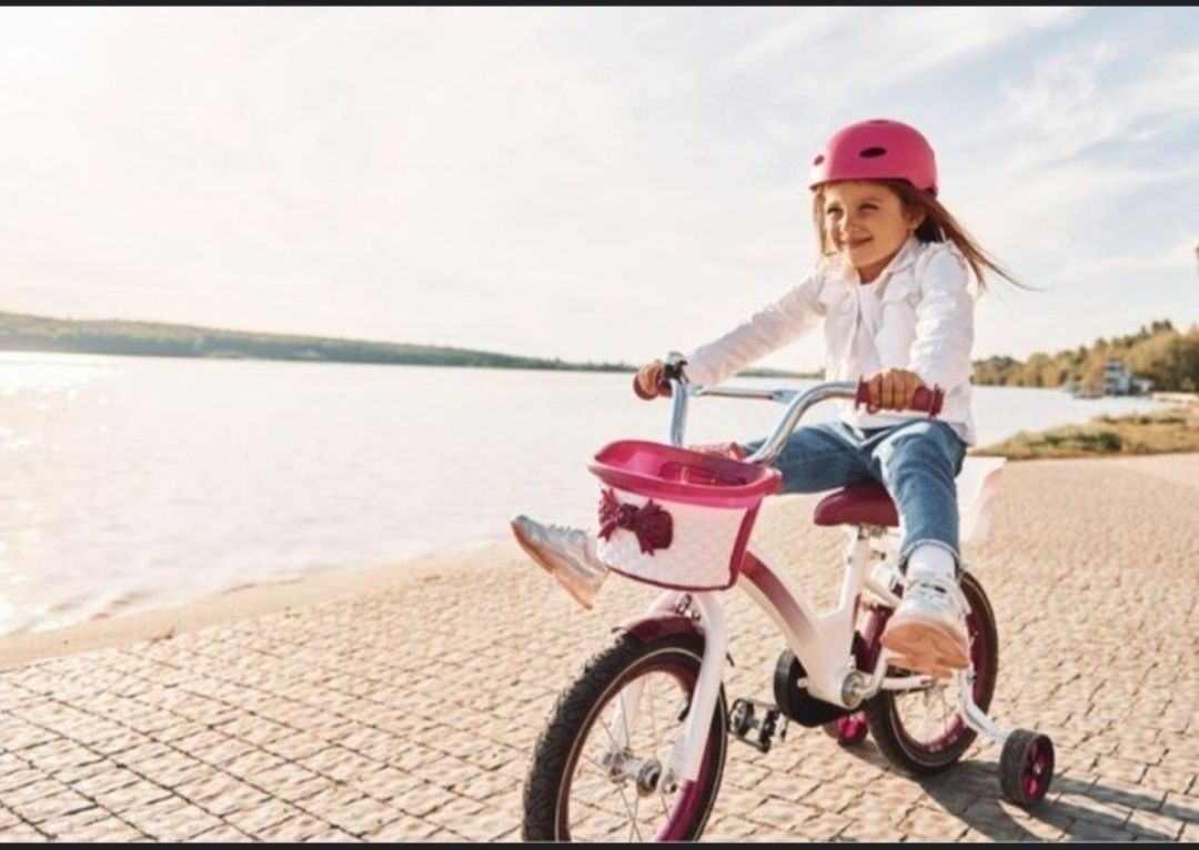 Детские велосипеды с боковыми колесами.