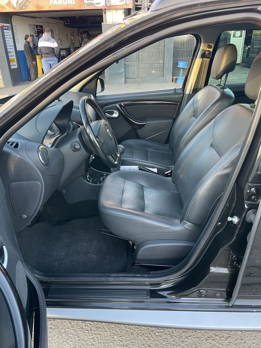 Dacia Duster benzina 1.6 110 cai tractiune 4x4 model prestige