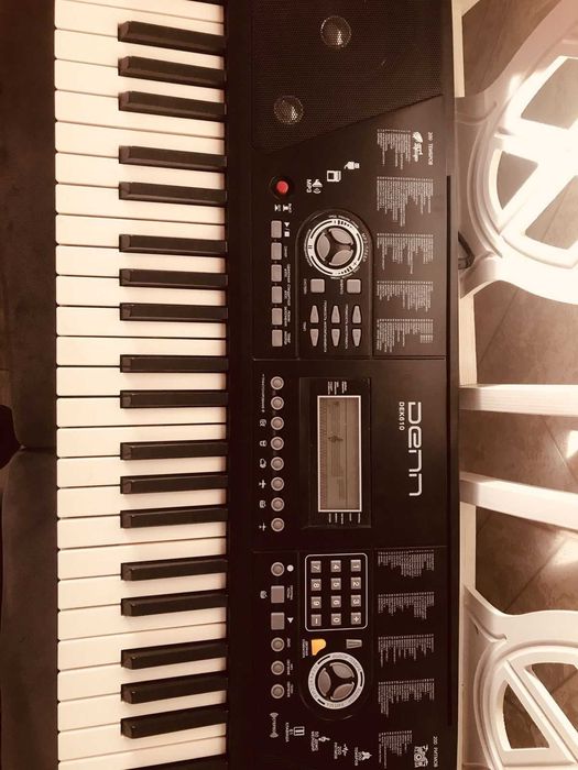 синтезатор новый Denn