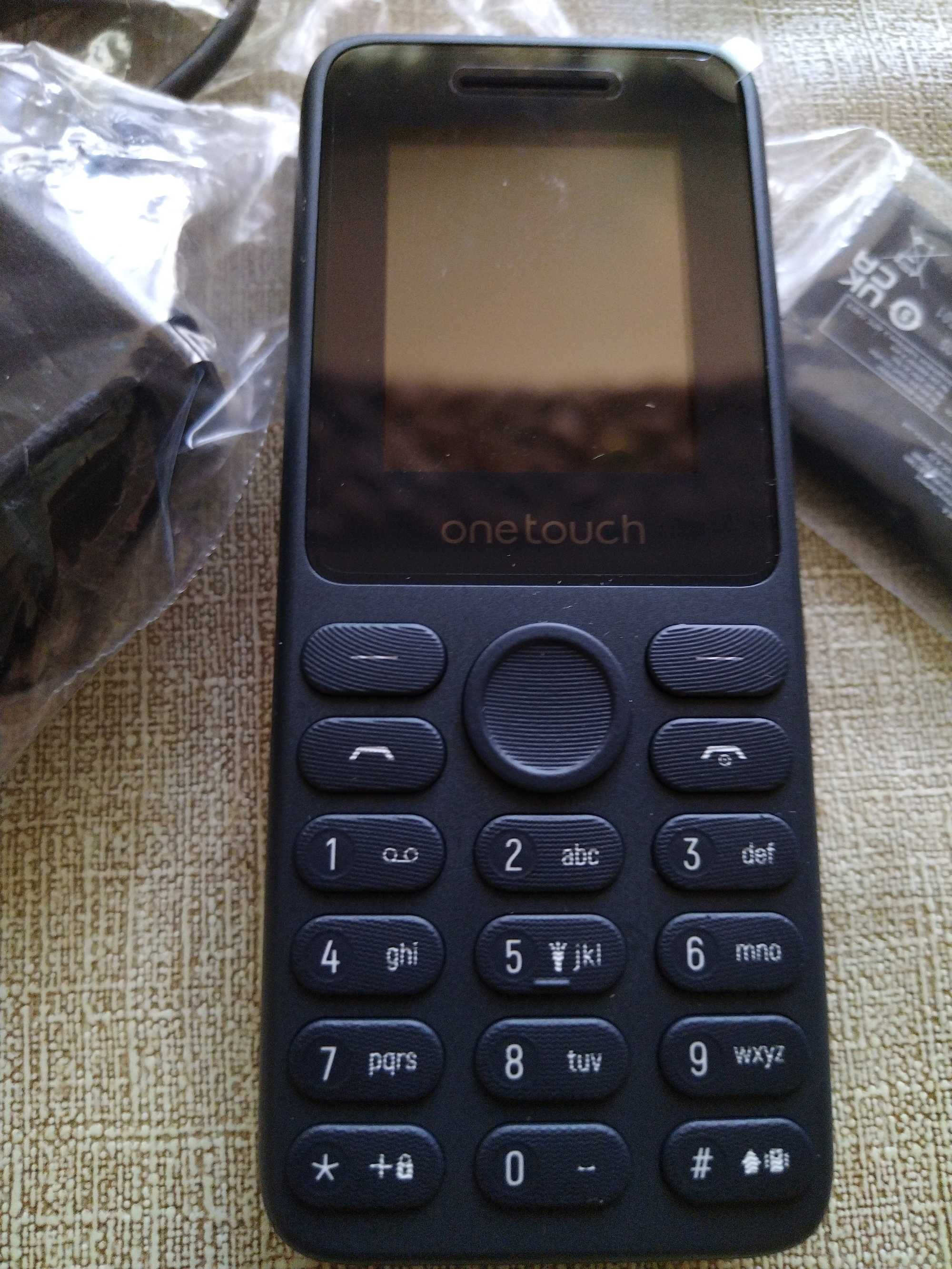 Телефон One tuch