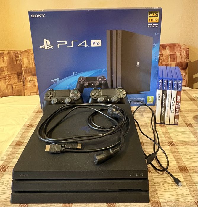 PlayStation 4 Pro 1TB - с подарък 6 игри