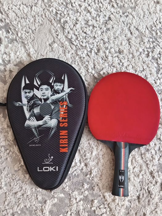 Теннисная ракетка