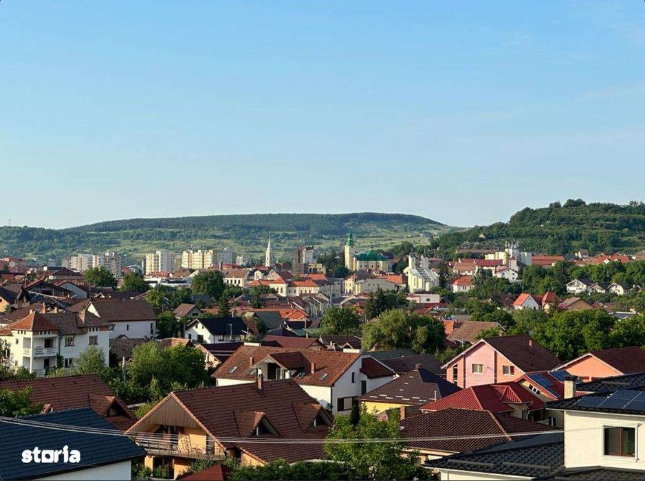 Teren intravilan 560 mp , front 25 m , cartier Sarmas - drum asfaltat