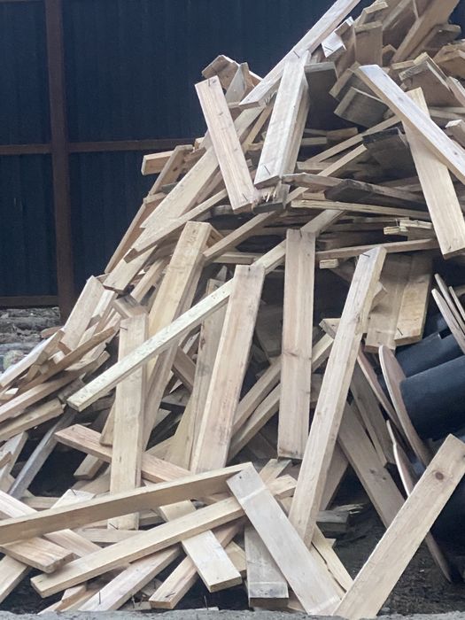 Дрова пиленые в мешках