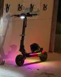 trotineta electrica KuKirin G4 cu pana pe spate