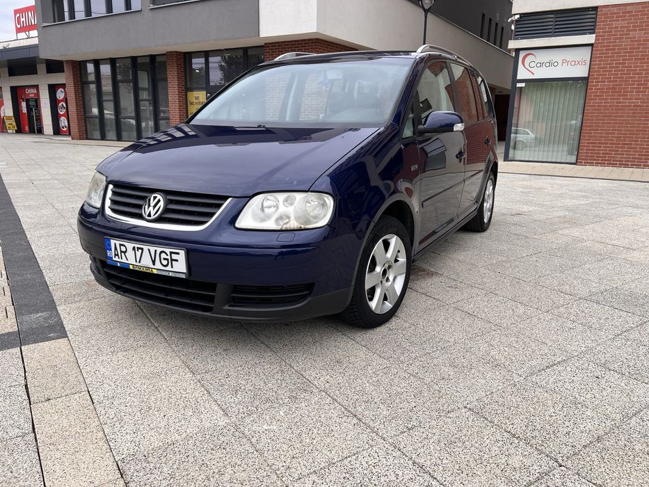 Vand sau schimb vw turan dsg 7 locuri