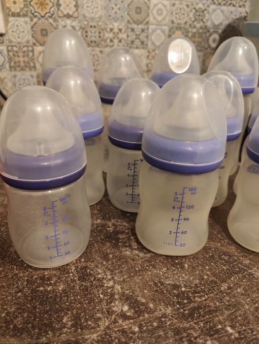 Vând 11 biberoane Lansinoh