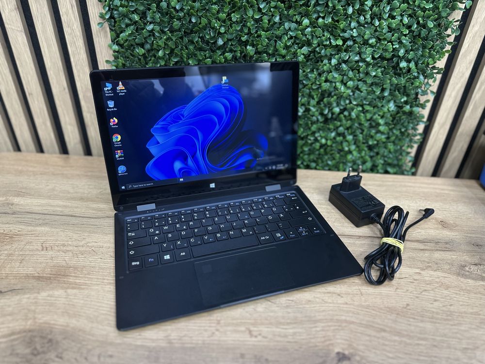 Laptop Trekstor Yourbook C11B , cu Amprenta si Touchscreen