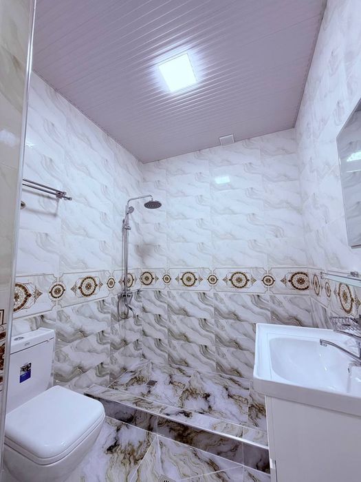 Продаётся Участок в Хасанбае в городе 2,4  сотки 8 комнат с кадастром