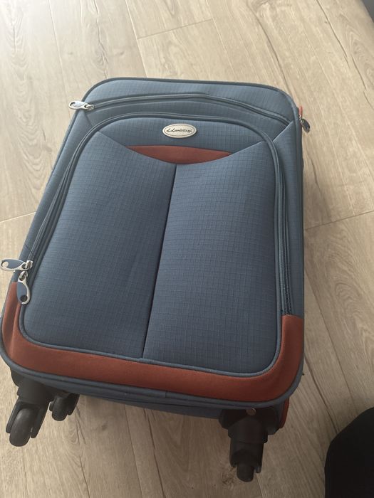 Troller dimensiuni carry on