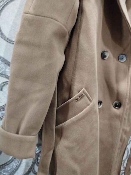 Женское польто……..