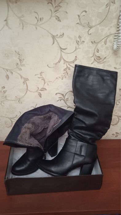 Сапоги высокие ,утепленные.