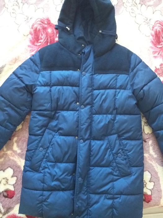 Продам детские зимние куртки