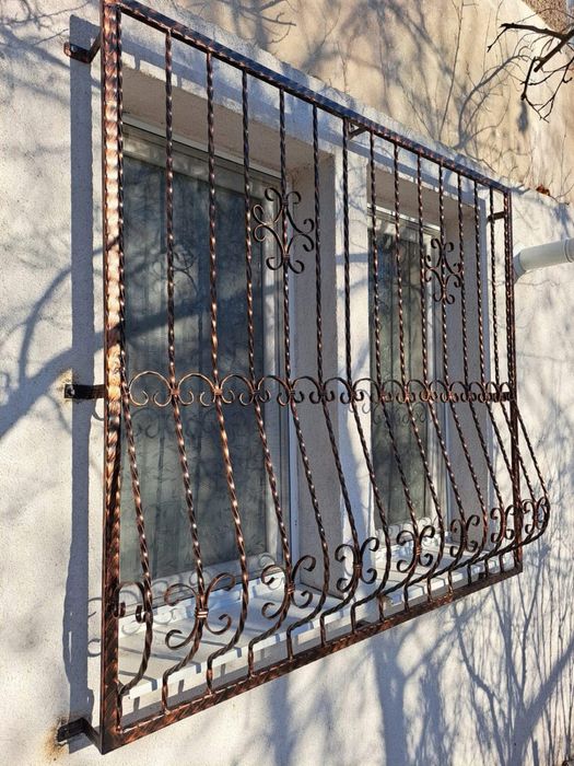 Gratii geamuri fier forjat