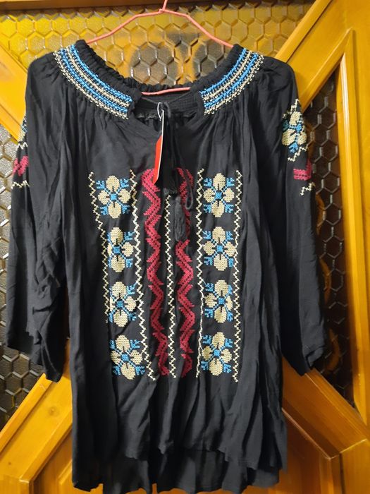 Ie nouă cu etichetă